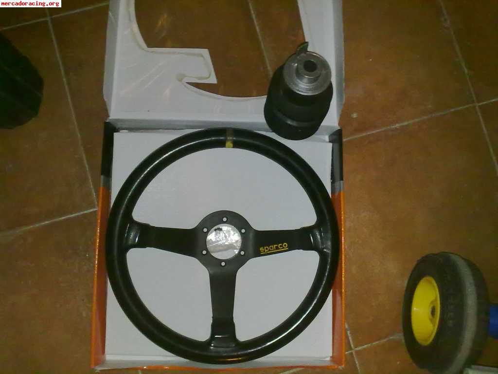 Vendo volante omp mas piña de peugeot 205