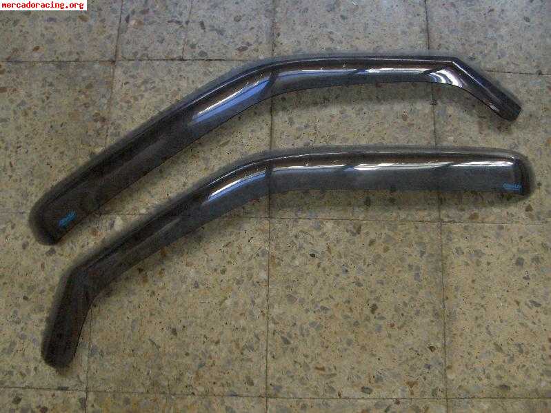 Vendo derivabrisas de puertas delanteros de ford fiesta xr2i