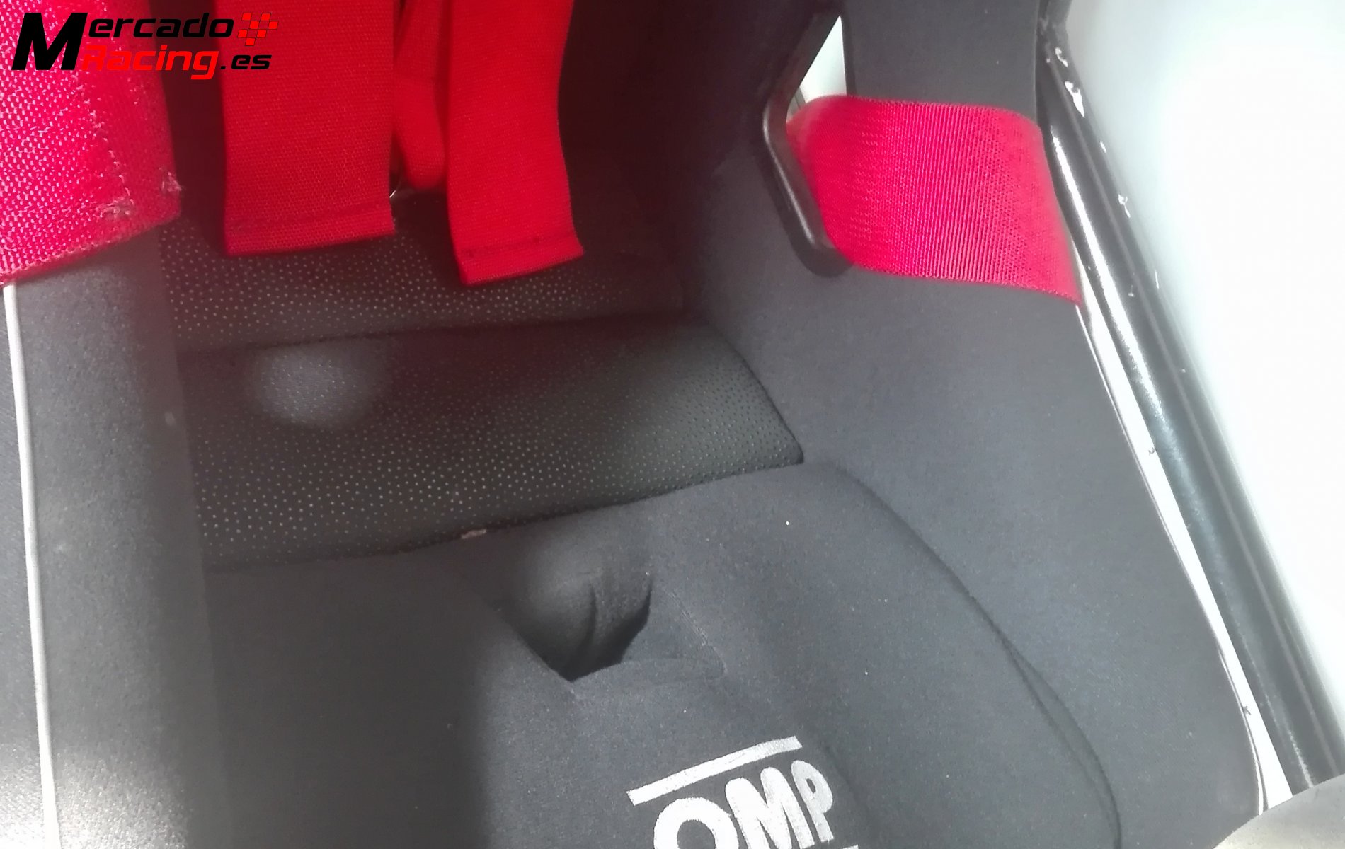 Asiento y cintos omp