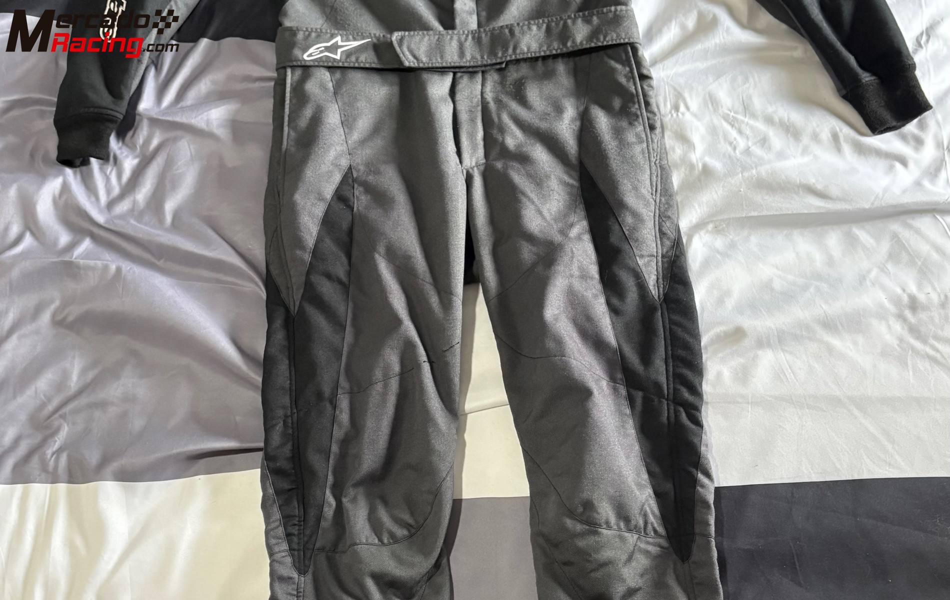 Mono alpinestars y ropa ignífuga oreca