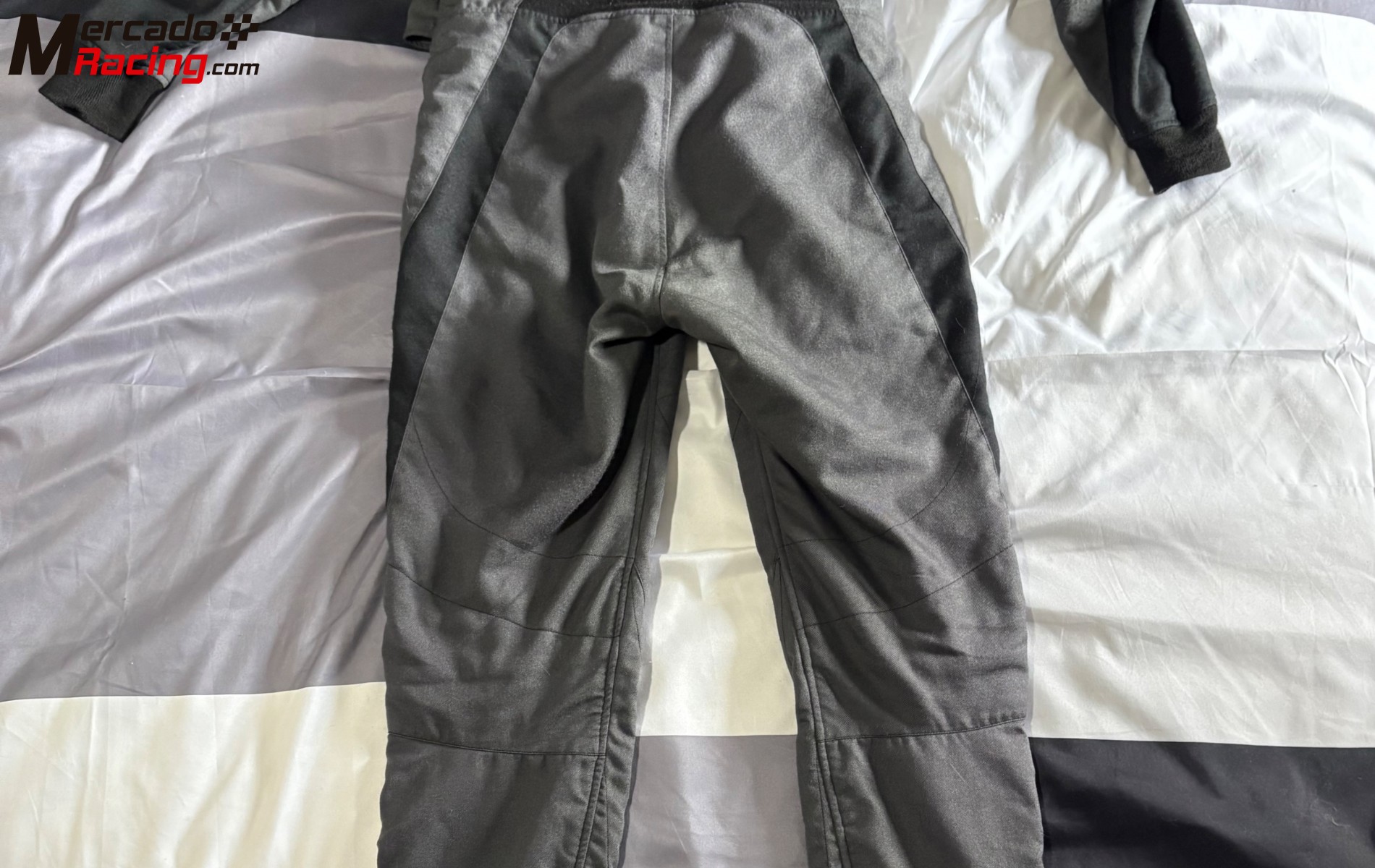 Mono alpinestars y ropa ignífuga oreca