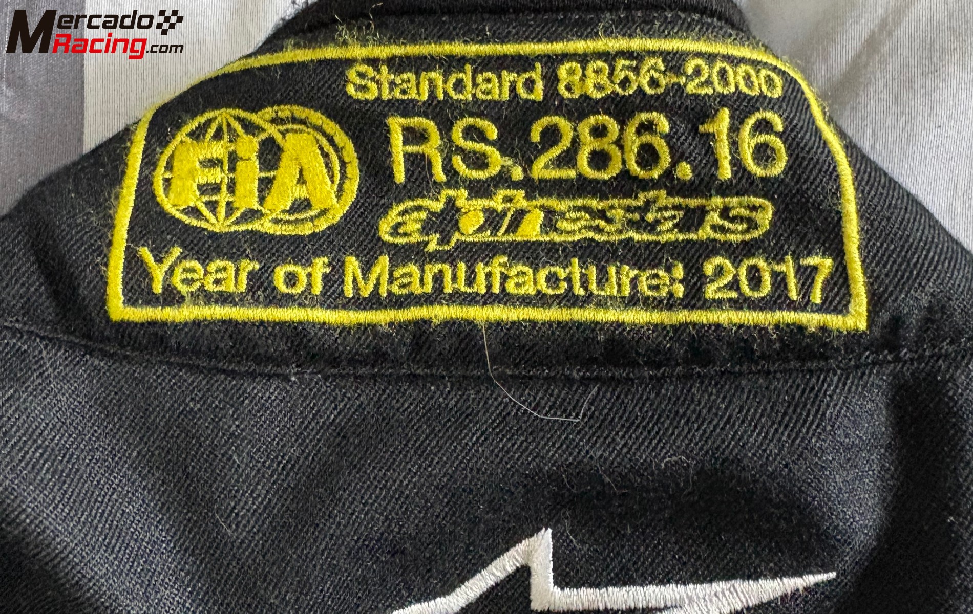Mono alpinestars y ropa ignífuga oreca