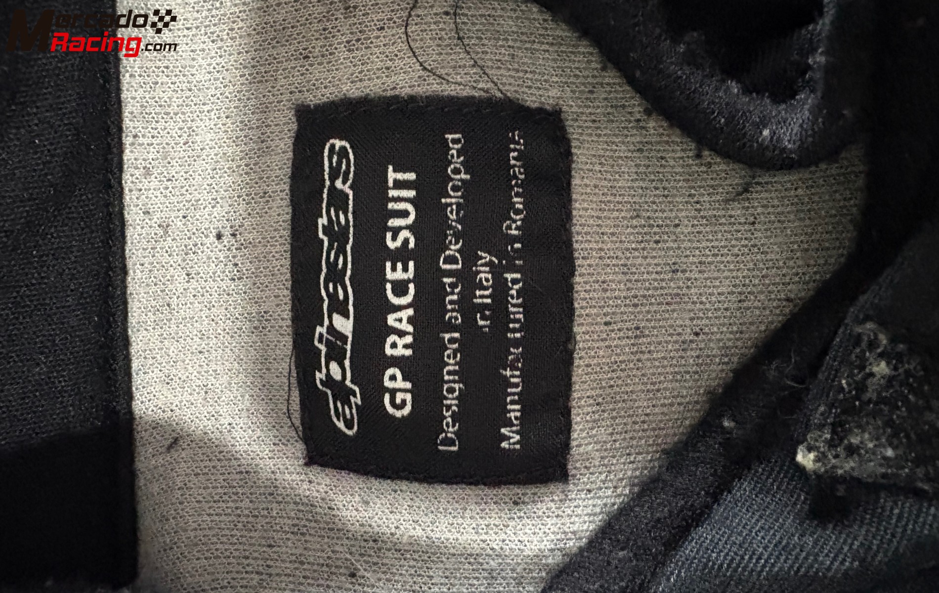 Mono alpinestars y ropa ignífuga oreca