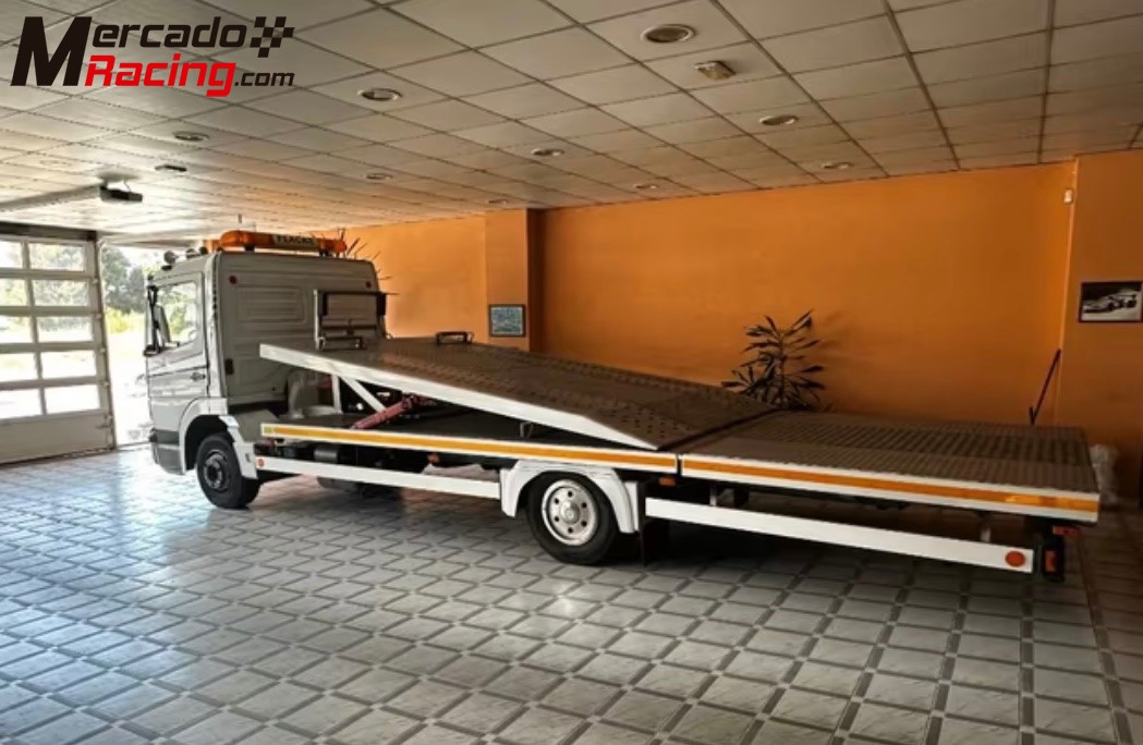Camión portavehiculos mercedes atego 823