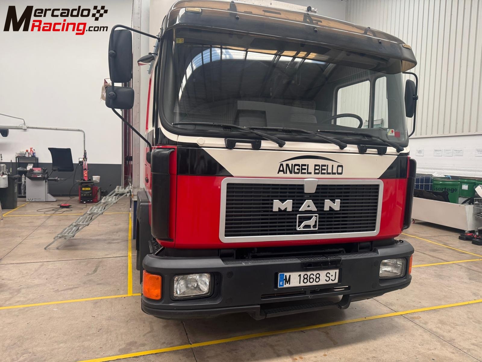 Man 12 232  camion taller con rampa