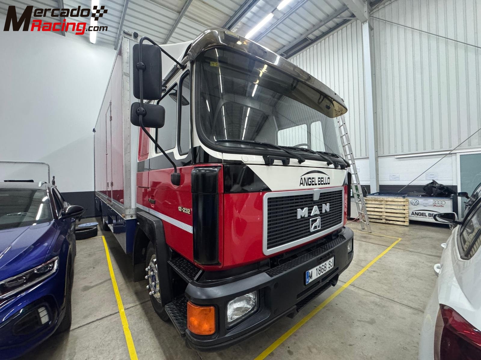 Man 12 232  camion taller con rampa