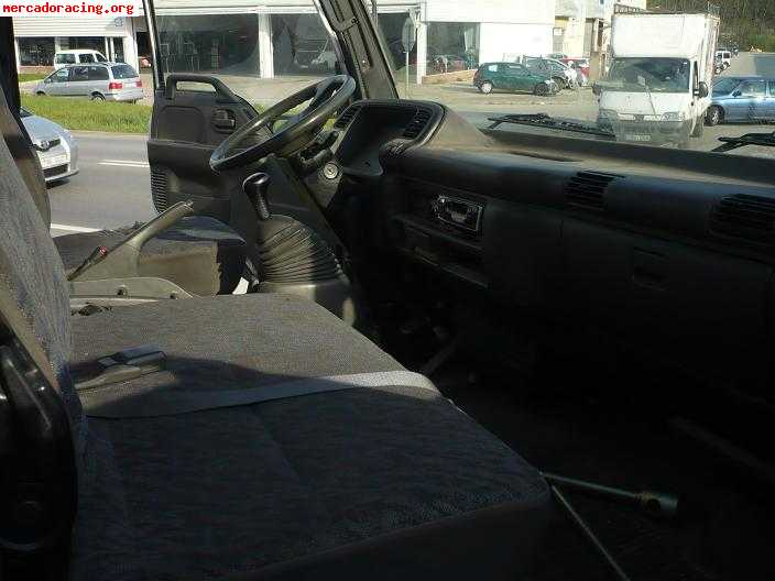 Isuzu npr 77 l   p35.04 camion caja abierta
