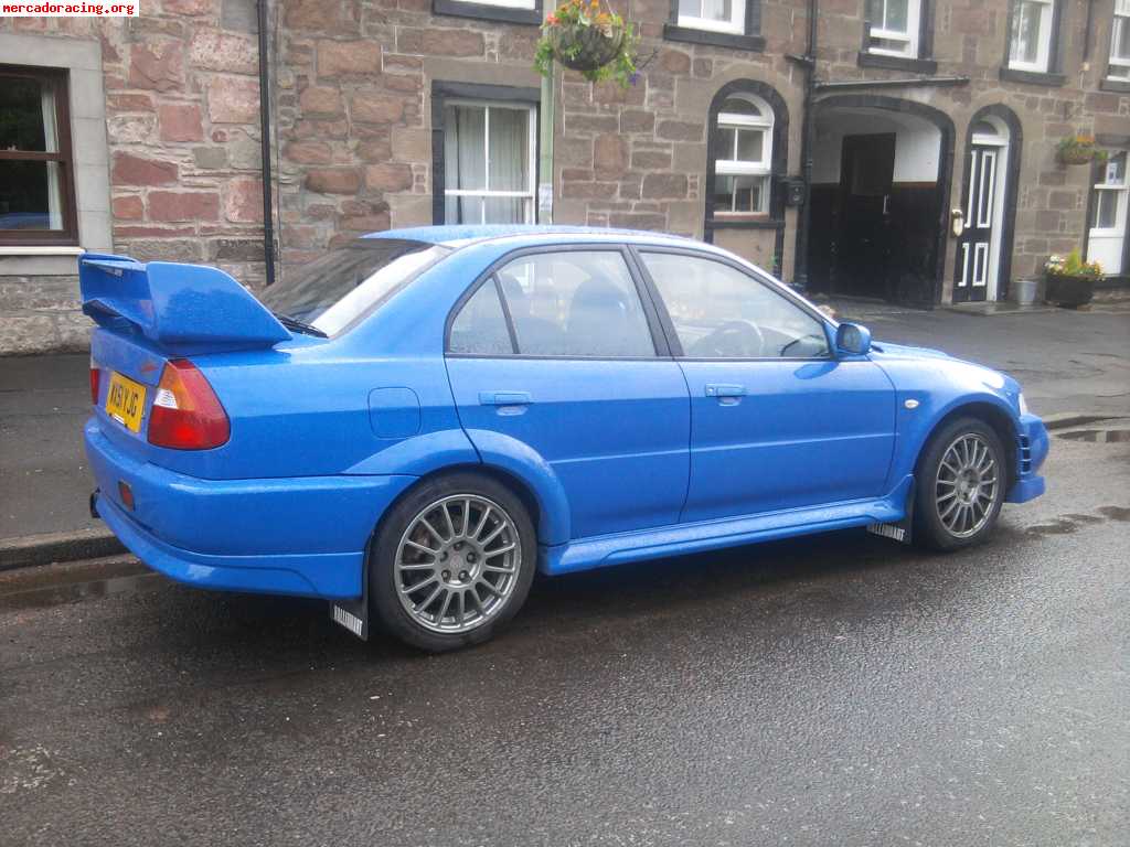 Mitsubishi lancer evolution vi volante a la derecha 6.999€