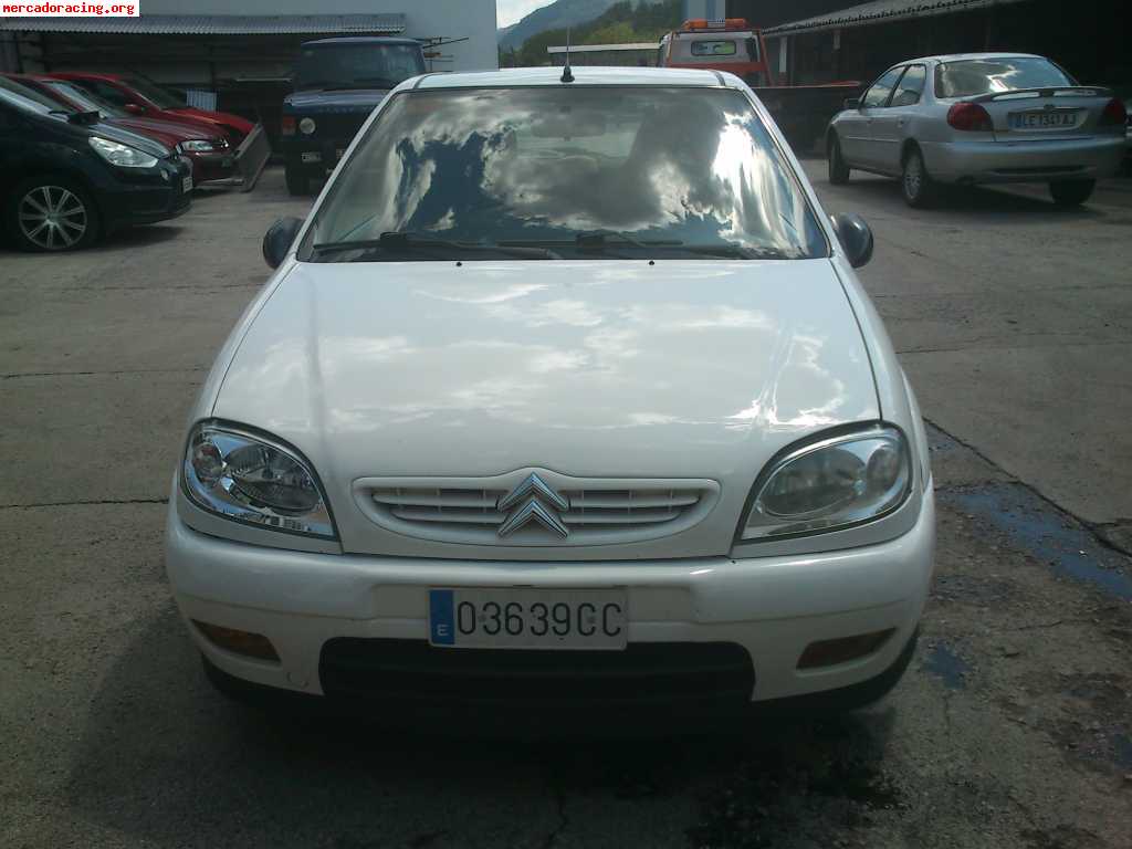 Se vende o cambia saxo 16v