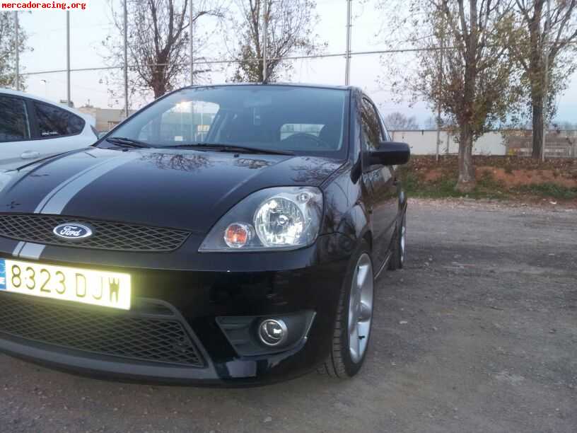 Vendo fiesta sport gasolina,mejoras.