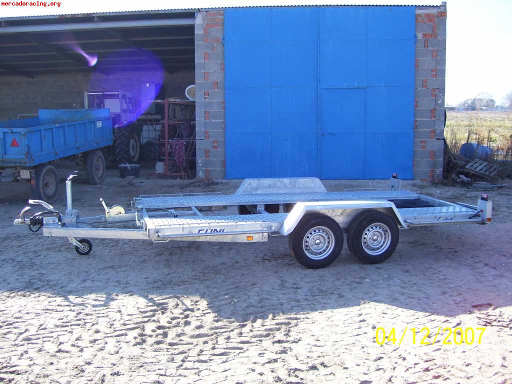 Vendo remolque portacoches casi a estrenar