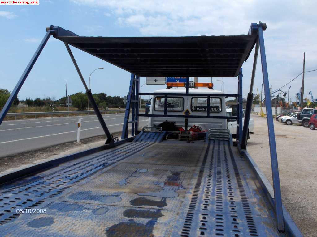 Se vende camion con plataforma deslizante para 3 vehiculos