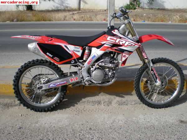 Busco rueda trasera, deposito y caja filtros de crf 250 2005