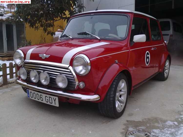 Mini cooper sportpack rojo con techo en blanco