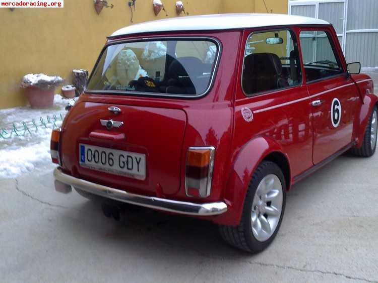 Mini cooper sportpack rojo con techo en blanco