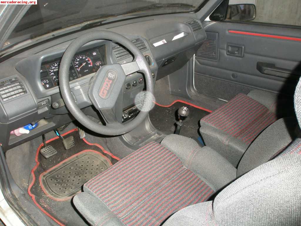 205 gtx con 75.000 km. reales por 850€