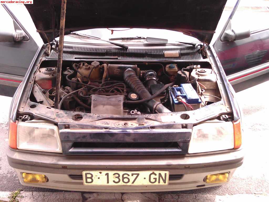205 gti 1.6, con mucho recambio.