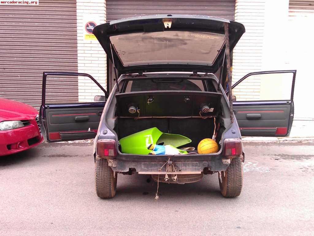 205 gti 1.6, con mucho recambio.