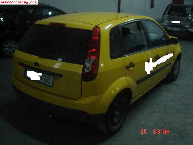 Ford fiesta con golpe www.jbjautos.com
