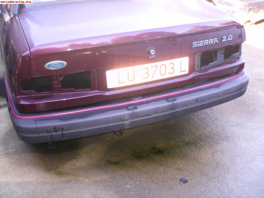 Compro paragolpes trasero ford sierra 2.0 gt 1989.