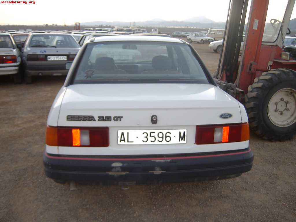 Compro paragolpes trasero ford sierra 2.0 gt 1989.