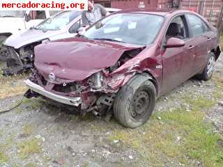 Se vende nissan primera con golpe frontal