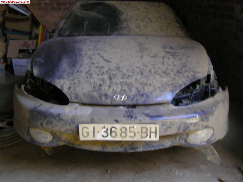 Vendo hyundai coupe 1600 fx 16 v, con el techo hundido, todo