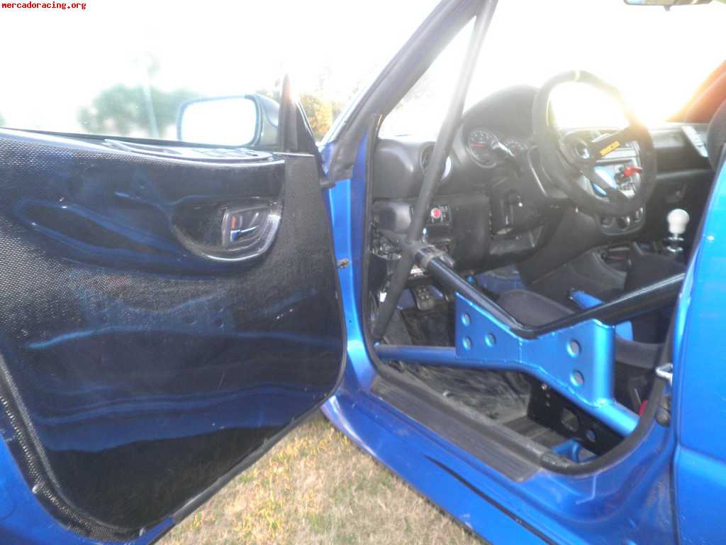 Subaru impreza asfalto nuevo