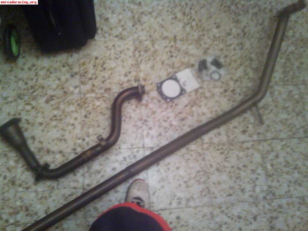 Supresor de escape de la marca rc racing y tramo intermedio 