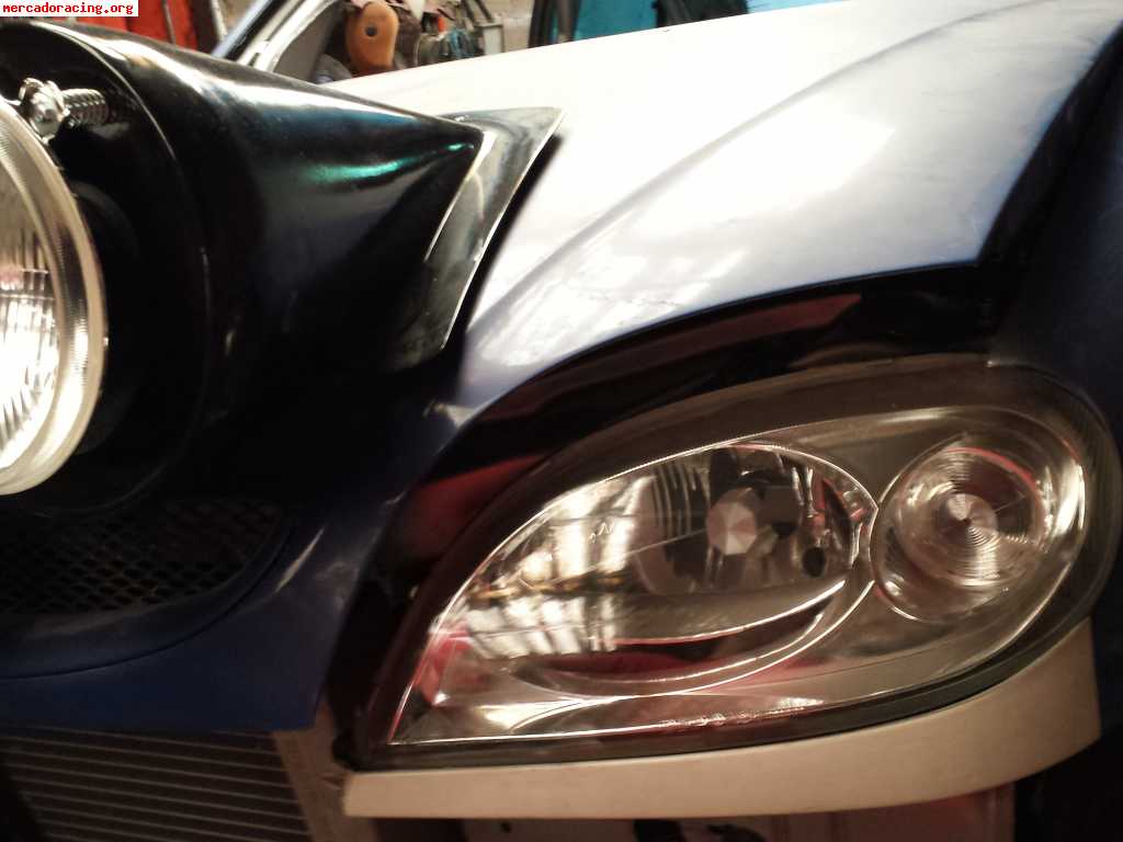 Parrilla de faros c2,saxo,106 con xenon