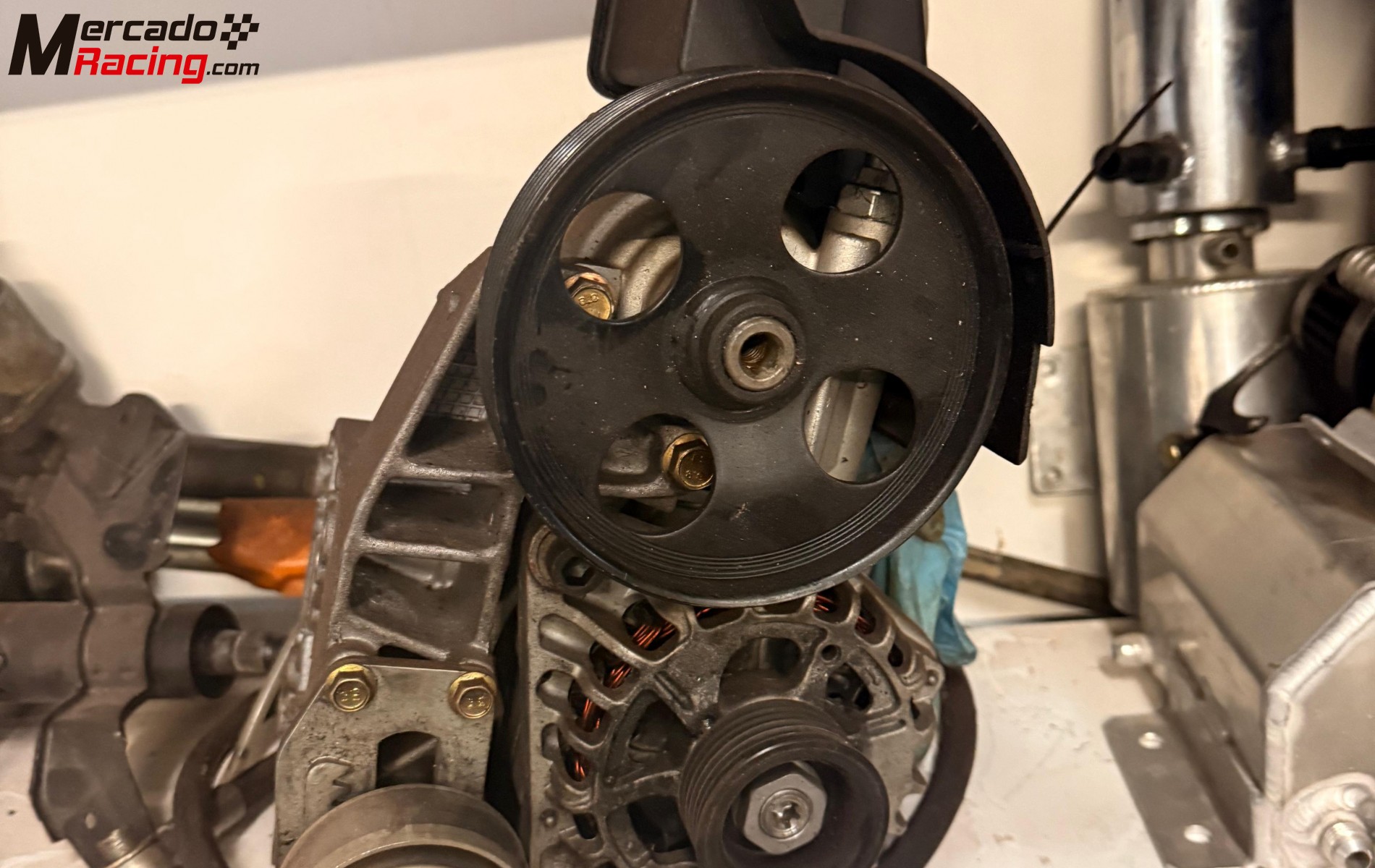 Bomba direccion + alternador + soporte motor psa 16v