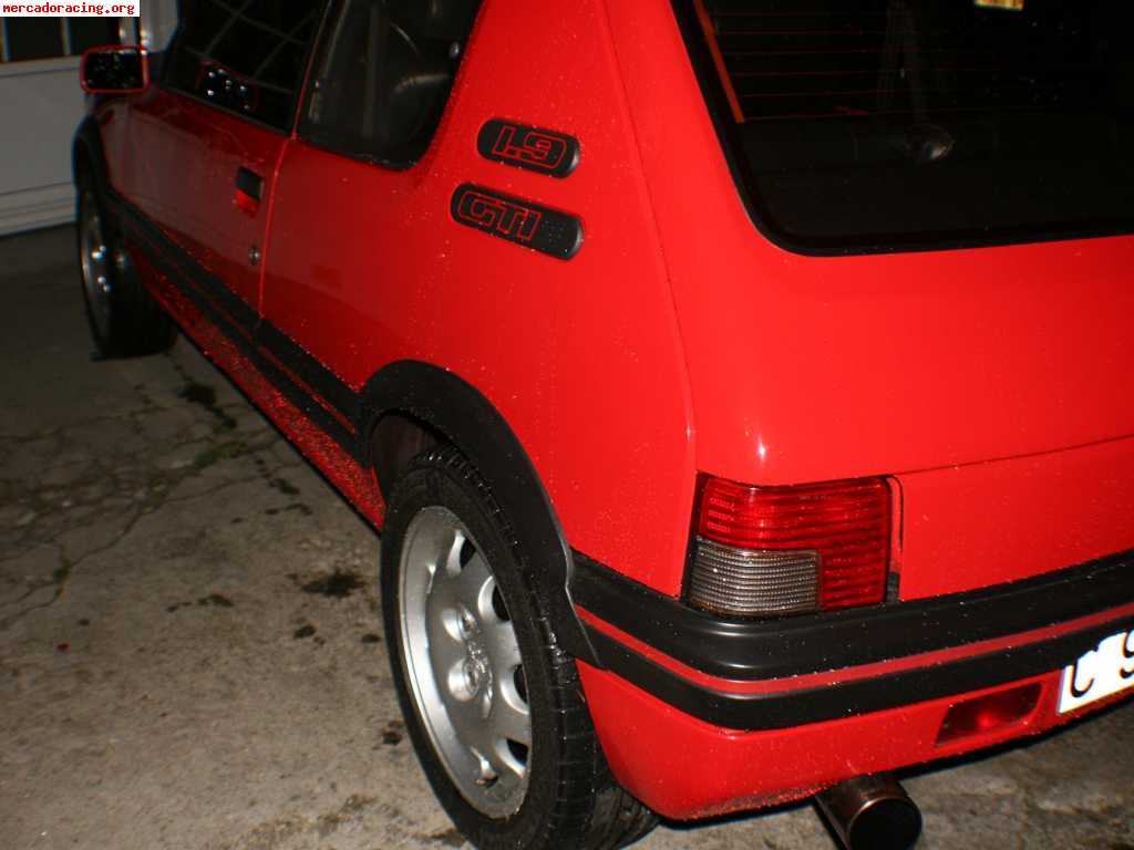 205 gti muy bonito. acepto cambio por moto de 600cc. 