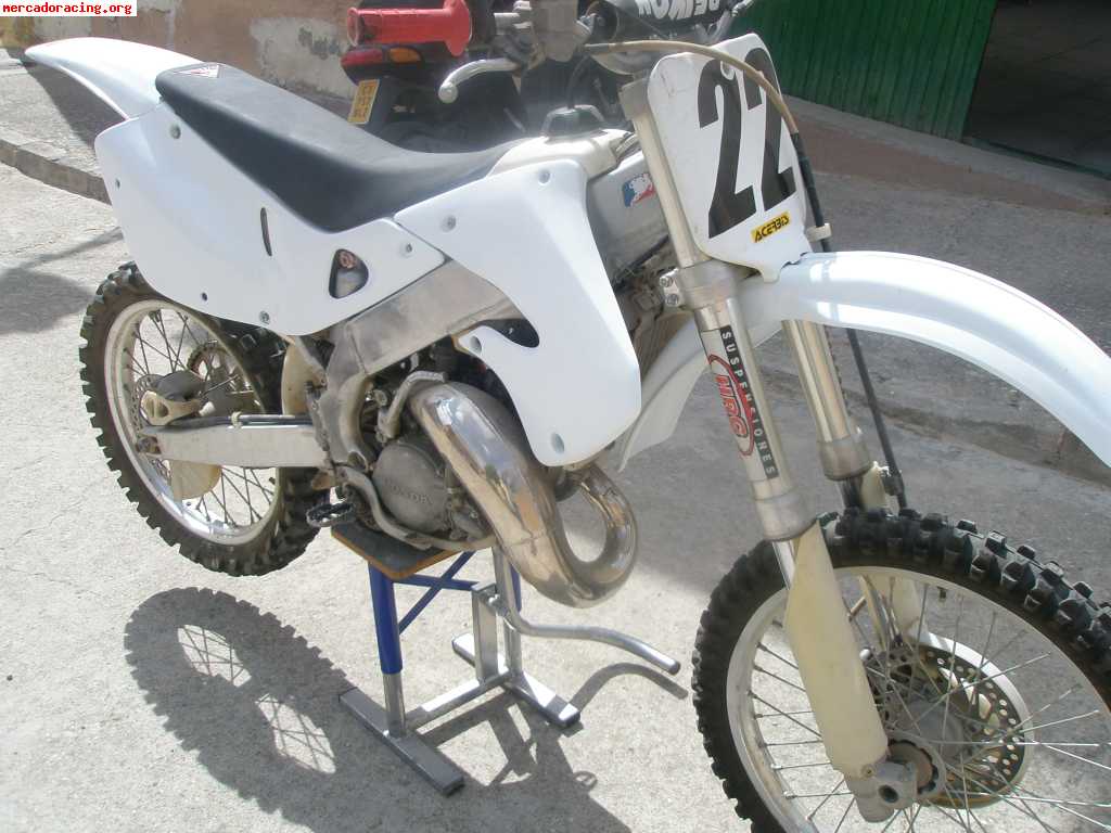 Vendo  o cambio moto honda cr de 125 año 98 chasis de alumin