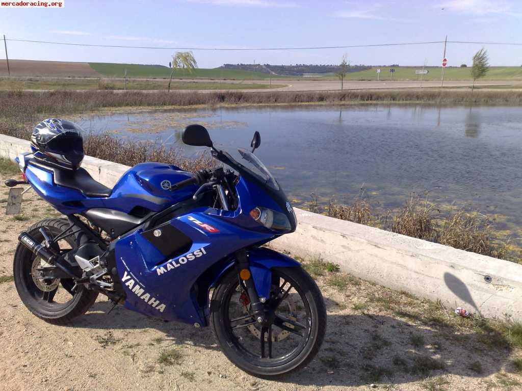 Se vende o cambia: yamaha tzr, año 2004, color azul, motor m