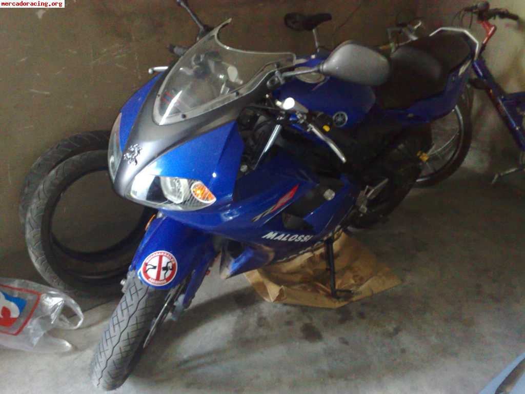 Se vende o cambia: yamaha tzr, año 2004, color azul, motor m