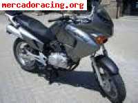 Se vende o se cambia honda varadero 125 por honda scoopy 125