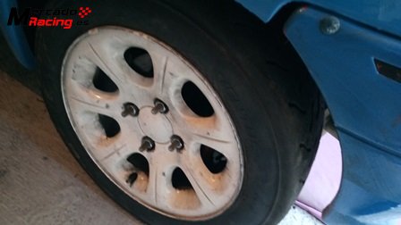 Llanta saxo 4x108 con slicks hankook