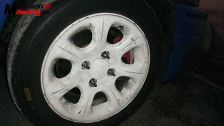 Llanta saxo 4x108 con slicks hankook