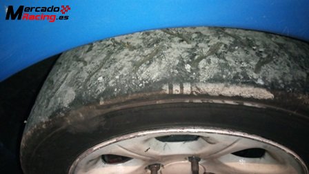 Llanta saxo 4x108 con slicks hankook