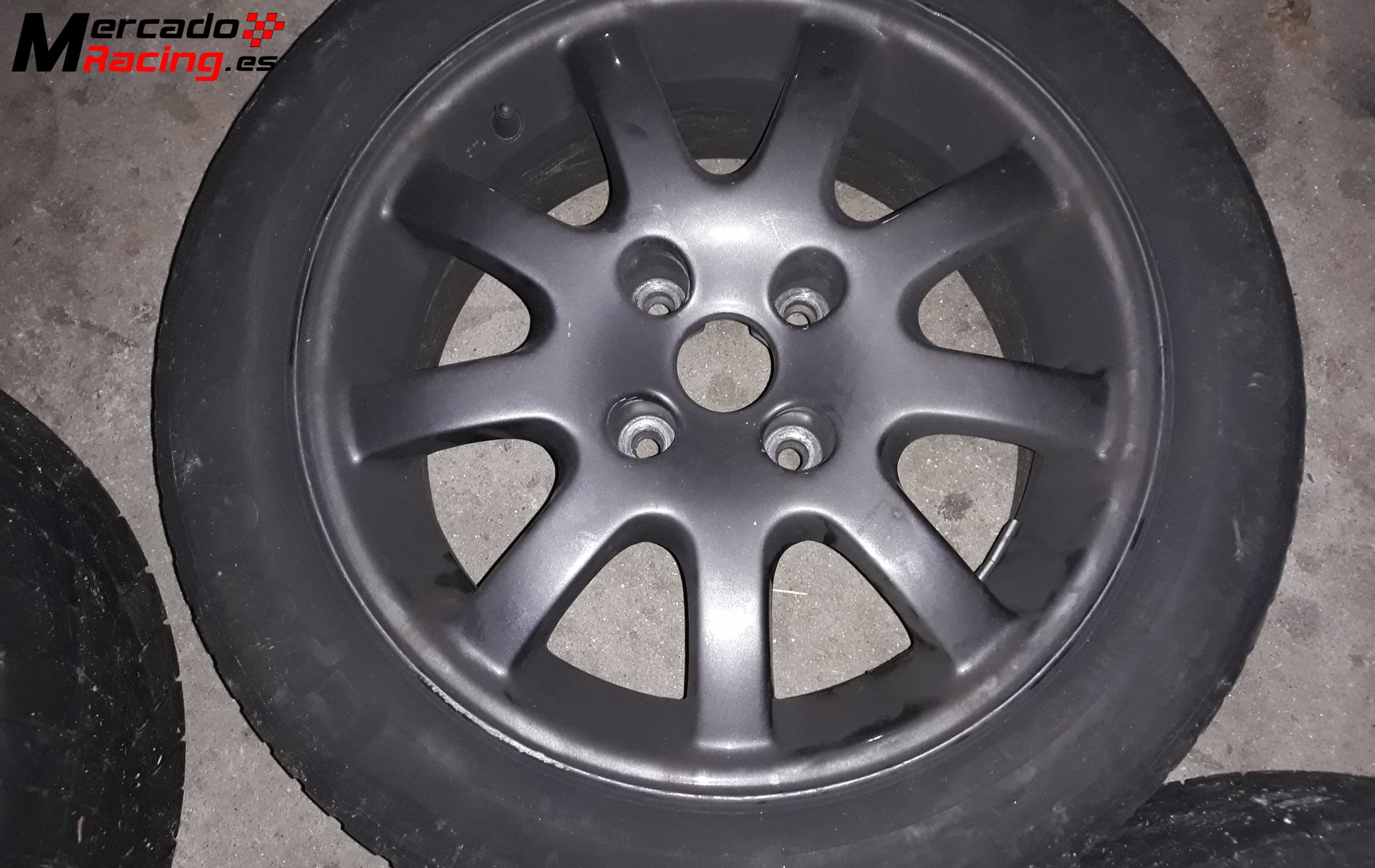 Vendo llantas con gomas de 206 gti en 15