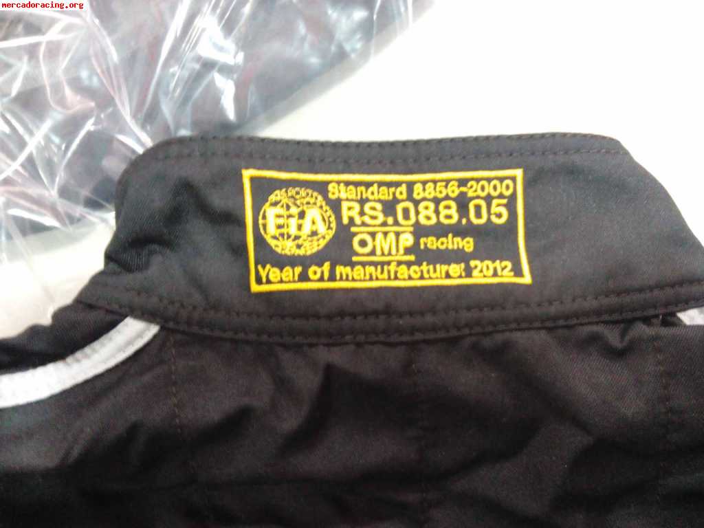 Vendo mono omp tuta first 2 negro talla 64 - 175€