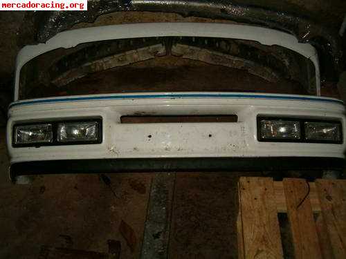 Defensa xr2i ultimo modelo nueva con faros originales hella