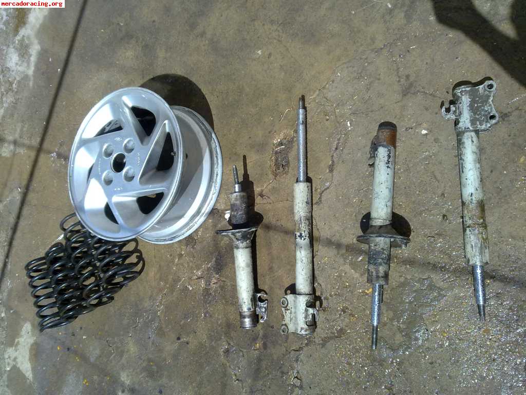 Amortiguadores, muelles y llanta rs turbo en 15  de ford esc