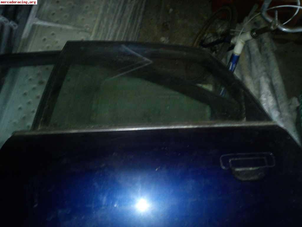 Vendo puertas y espejo de audi a4 carrocería b5. 