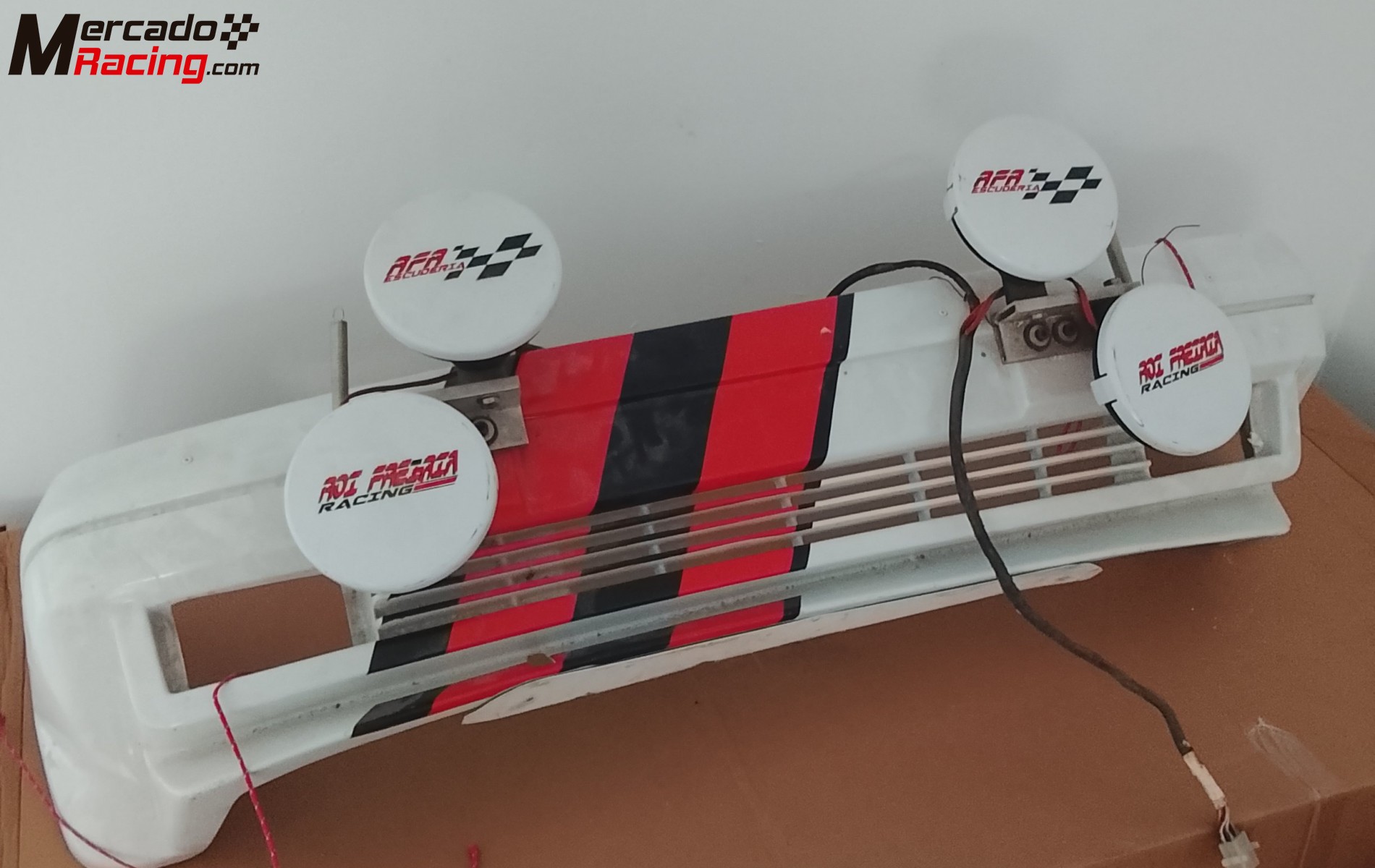 Se vende parachoques de renault 5 gt turbo de fibra en buen estado con focos de largo alcance y cune