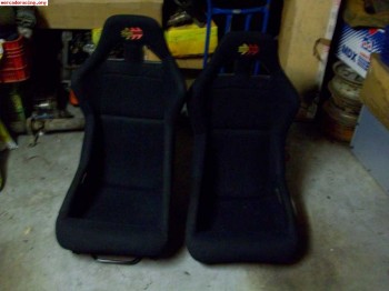 Pareja de baquets y armes