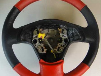 Volante a estrenar cuero negro rojo ibiza 2006
