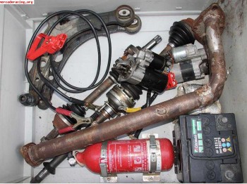 Caja bateria, cable auxiliar, parrilla faros y frenos 4 pist