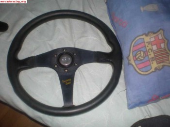 Volante momo y filtros green.