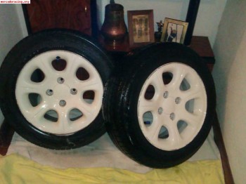 Cambio llantas de saxo vts en blancas por semibakets